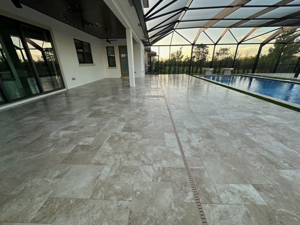 Cleaned screened pool deck at a South Florida home