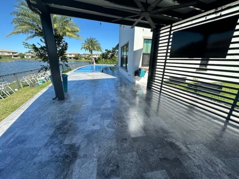 Pool deck and screen enclosure after cleaning