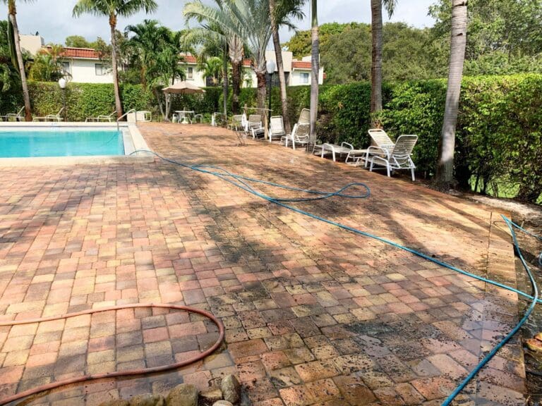 Brick style pavers beside a pool