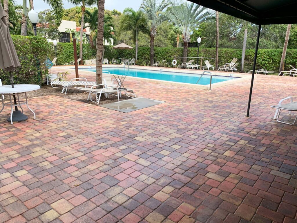 Sealed paver pool deck with restored color
