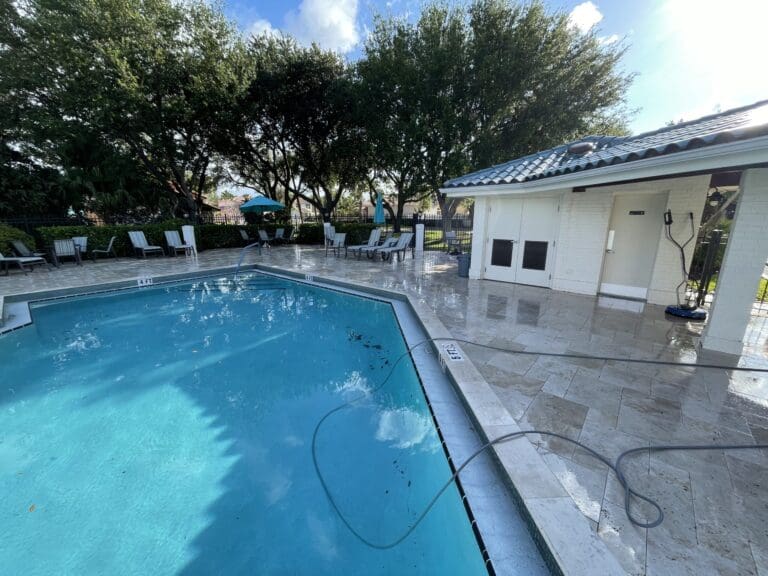 Pool deck and screen enclosure after cleaning