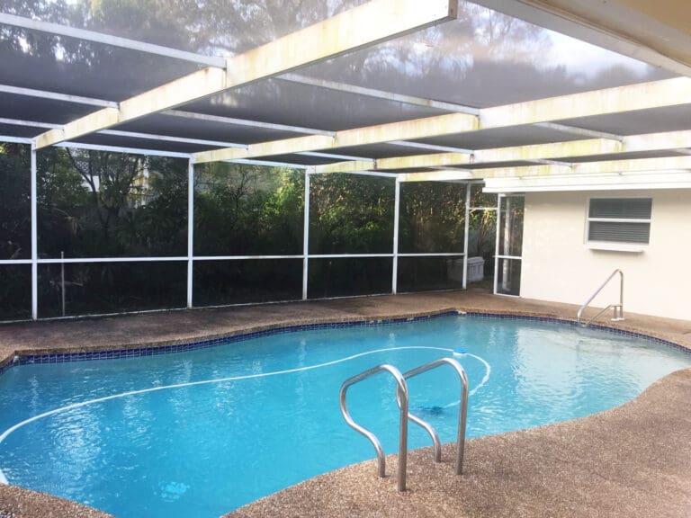 Pool deck and screen enclosure after cleaning